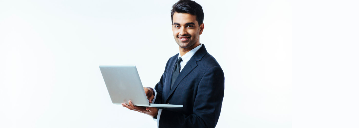 businessman holding laptop